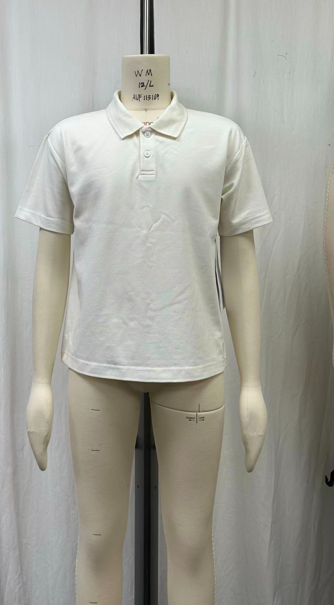 A short-sleeve collared polo sample in a neutral color.