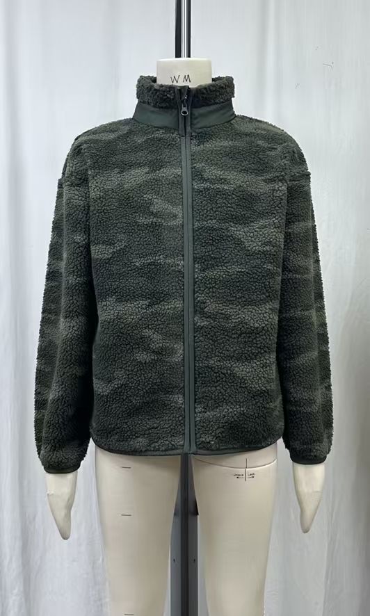 A full-zip jacket with a stand collar and textured finish.